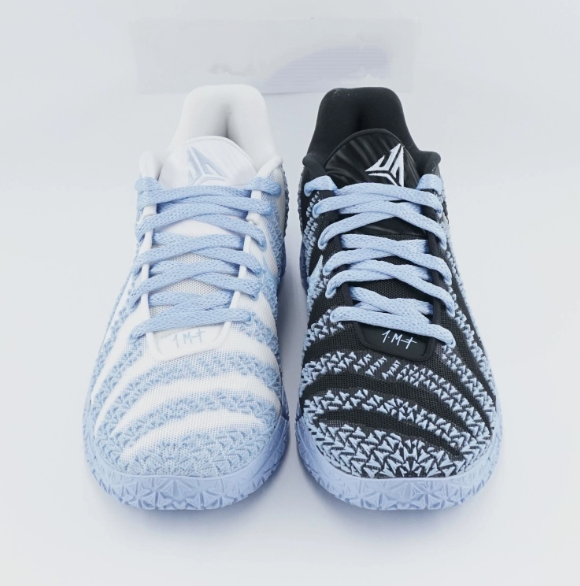 Black, white and blue flashing basketball shoes