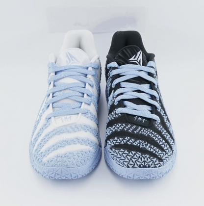 Black, white and blue flashing basketball shoes