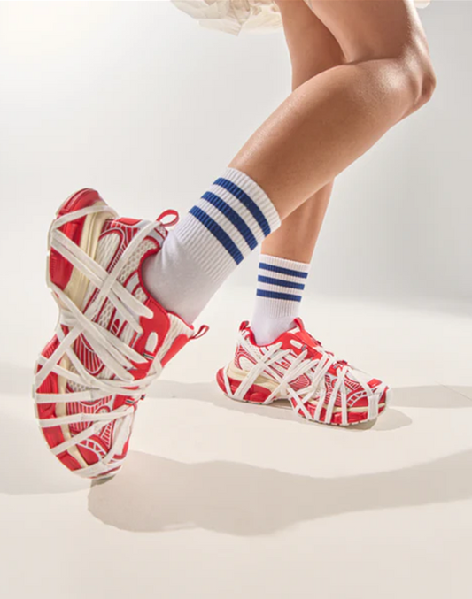 Red flat sneakers