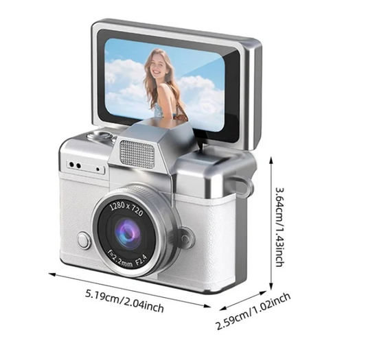 A mini, compact digital camera with a 1.47-inch LCD screen.